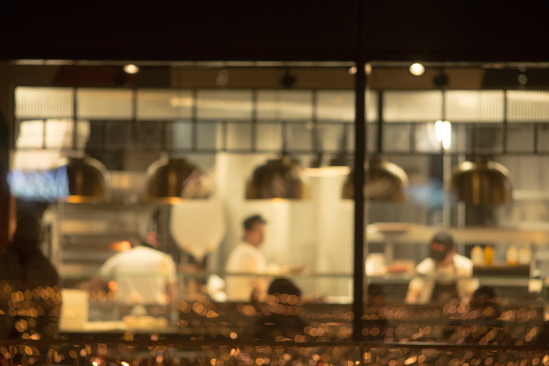 Chefs working in a busy commercial kitchen